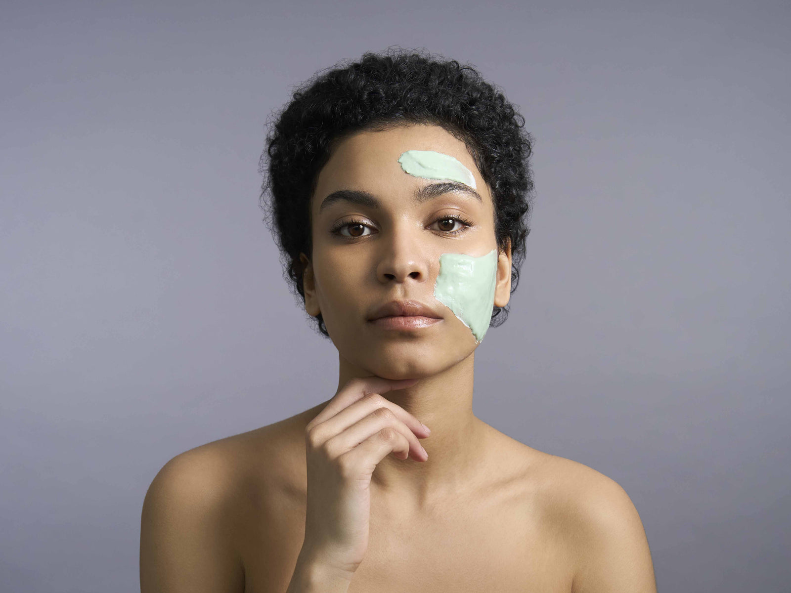 Woman rinsing her face